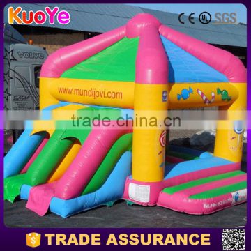 colorful inflatable bouncer with slide sliding jumping castle juegos inflables china