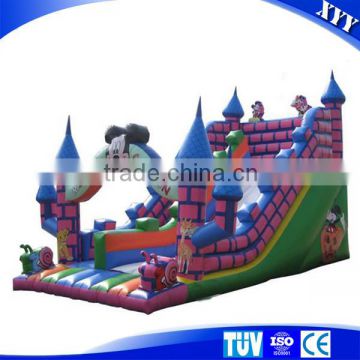 Inflatable bouncy jumping castle with water slide