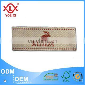 Shuttle loom woven garment label for cloth