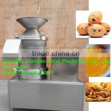 egg knocking machine/egg shell breaking machine /automatic egg breaking machine