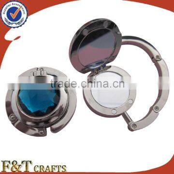 Fashion round portable bag hanger with mirror