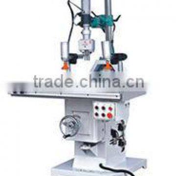 VERTICAL HORIZONTAL MULTI-AXLE WOODING DRILLER