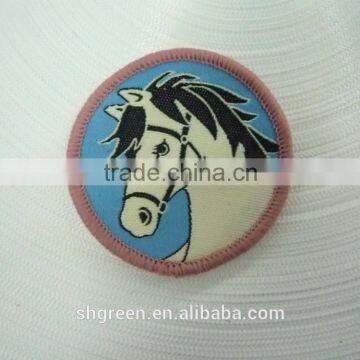 Round high density woven label with serging border for kids garment