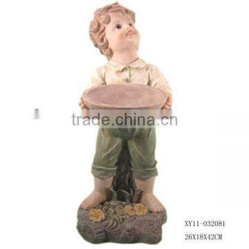 Resin boy for garden bird feeder