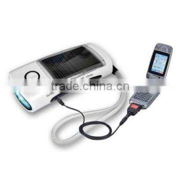 Solar torch with mobile charger/FM radio