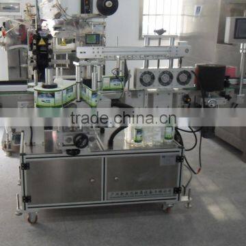 Automatic shampoo bottle labeling machine