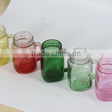 Colorful glass mason jar with emboss logo and lid