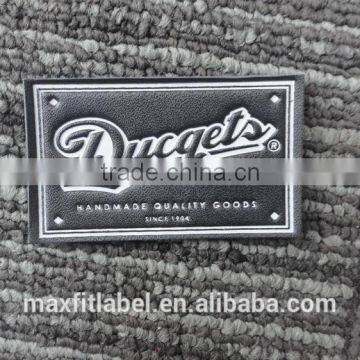 Jeans patch embossed leather label