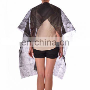 Nonwoven disposable salon cape hair cutting capes