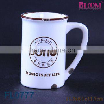 Handmade white ceramic beer mug for tableware