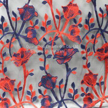 China manufacture red and deep blue parch flower embroidered lace fabric for dress