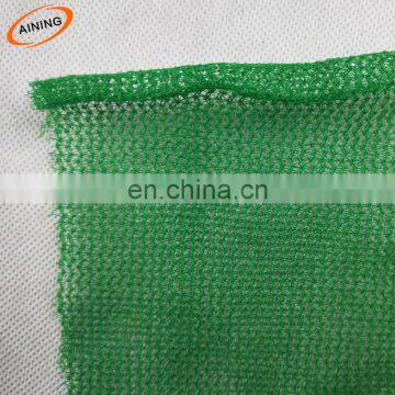 Plastic orange construction safety net installation for children