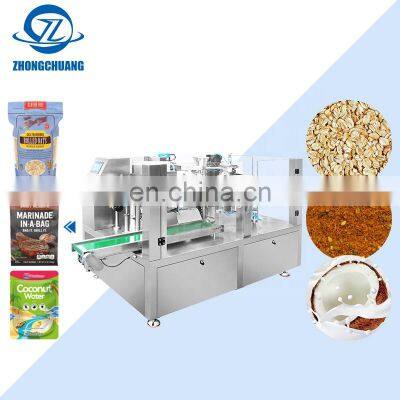 Automatic Weighing Grain Powder Filling Packaging Liquid Stand Up Bag Rotary Premade Pouch Packing Machine