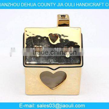 wholesale plating gold ceramic hollowed-out hand lamp