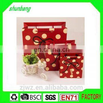 2015 fashion commercial red string retail paper gift bag for promotion