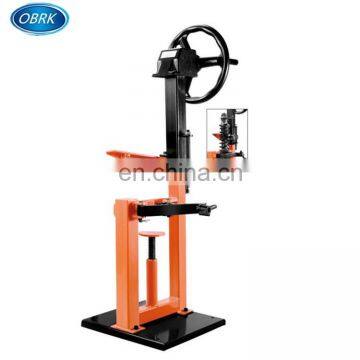 Shock absorption spring compressor