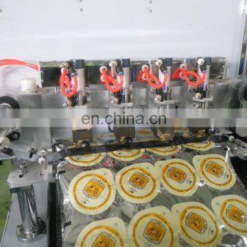 Fully Automatic Flavoured Fruit Milk Cup Filling Sealing Machine photo-3