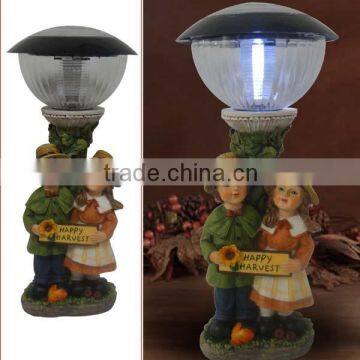 Children boy and girl Harvest festival decorations polyresin statues solar garden light