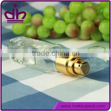 With gold pump transparent cosmetic square glass bottle 40ml