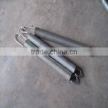 Farm tractor engine governor extension spring