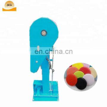 automatic snap button attaching machine