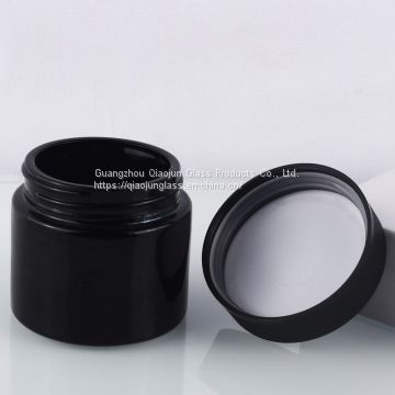 Top Quality 70G Cosmetic Bottles Round Black Glass Jars Containers With Screw Cap