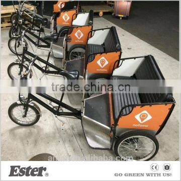 Pedal passenger tricycle with cabin