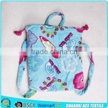 Magic island beach towel in bag with towel straps of reactive print