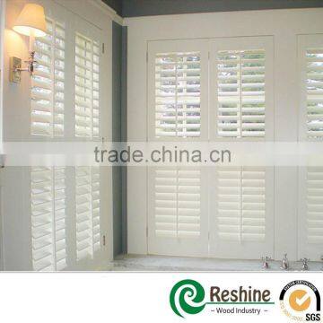 Vinyl fauxwood interior plantation window shutter