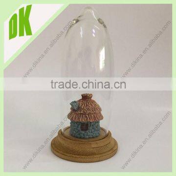 Small Sculpture in Mid centry Clear Glass Globe with Wooden Base