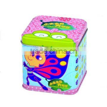 Children watch package with square tin can