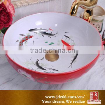 Hot sale red bathroom wash sink with vivid goldfish lining