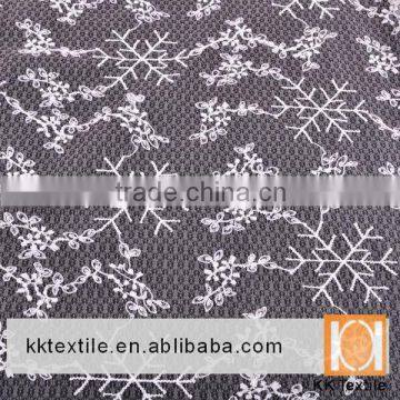 China manufacturer embroidered sheer fabric for sexy wedding dress