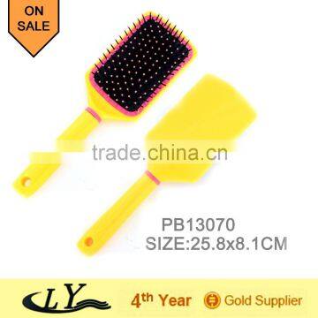 Plastic detangling hair brush