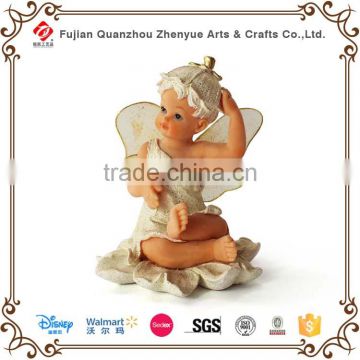 Polyresin smiling sitting angel figurine