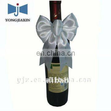 Pre-tied bow used in wine bottle