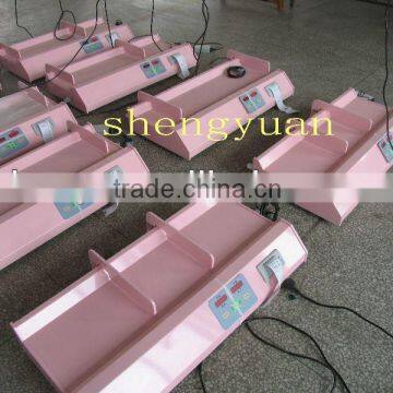 Horizontal baby spring scale