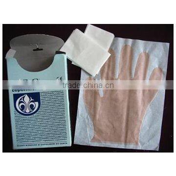 PE gloves,latex gloves,PEC gloves, PE glove on paper,gloves,disposable PE gloves