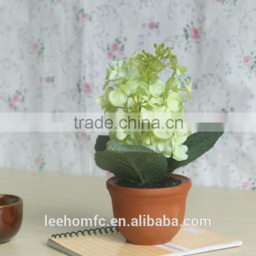 artificial green hydrangea in pot