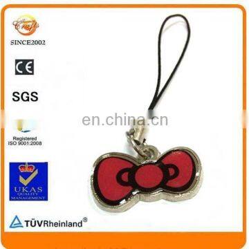 A Bow-Tie shape design epoxy metal parts cell phone charm