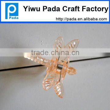 orange dragonfly flower clip