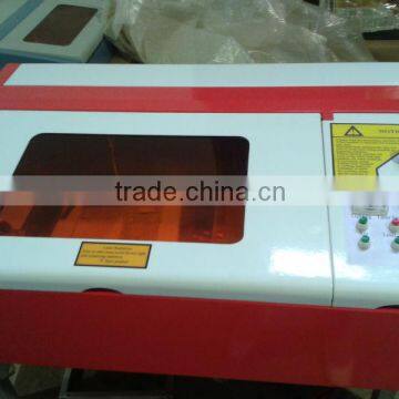 new condition and BMP/DXF/PLT graphic format supported laser cutter