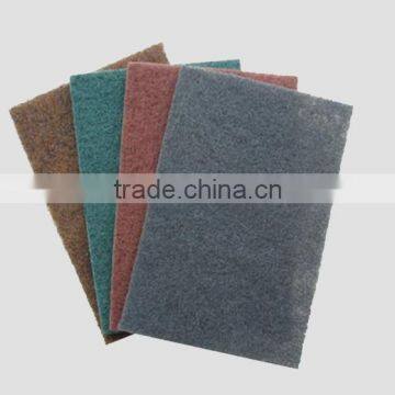 Industrial nylon scouring pad for wood and metal