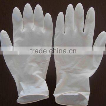 Textured latex examination gloves