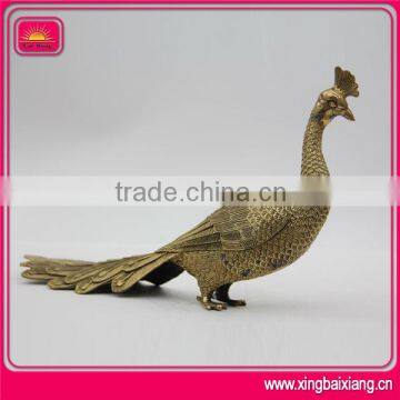 brass lion statue,peacock statue,wolf statue