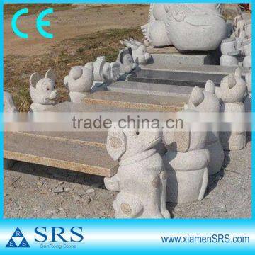 Outdoor stone animal bench