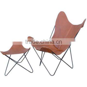 Leather butterfly chairs with footstools