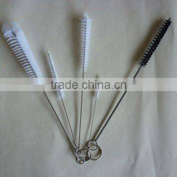 Twisted-in-wire cleaning brushes