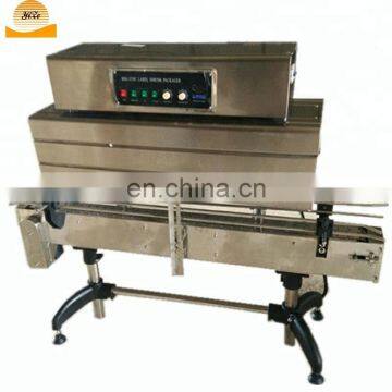 Semi-automatic Juice Bottle Label Sleeve Pet Bottle Cap / Pipe Shrink Wrap / Wrapping Machine photo-2