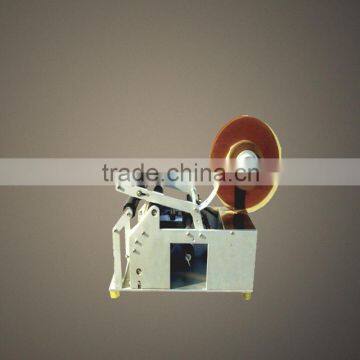 MT-50 manual bottle label applicator